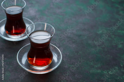 Two glasses of black strong turkish tea. Healthy break relax concept. Slow life, copy space