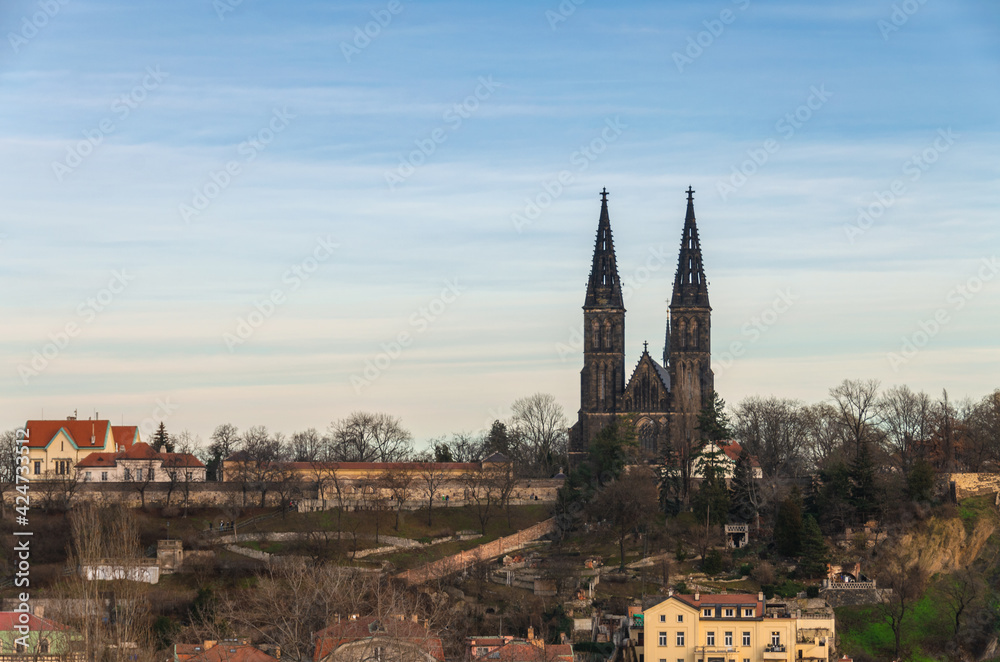 View of Vysehrad Castle and Basilica of St. Peter and Paul in Prague, Czech Republic, in sunset