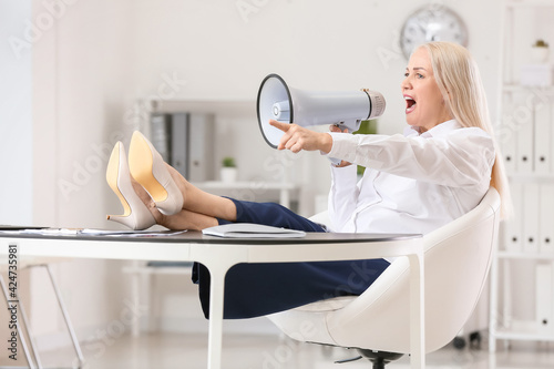 Stressed mature woman with ...