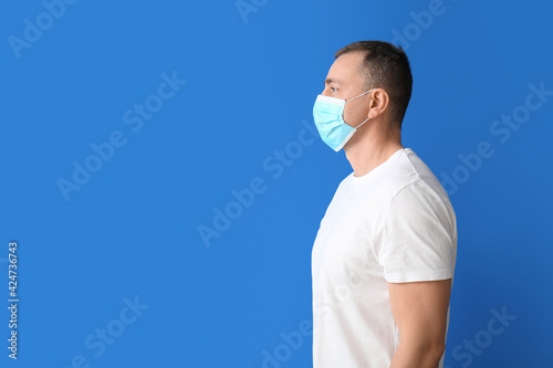 Mature man in medical mask ...