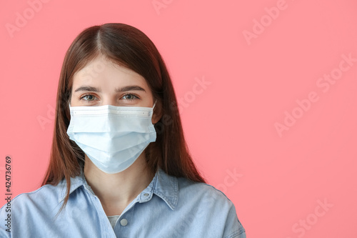 Young woman in medical mask...