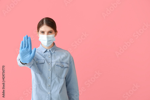 Young woman in medical mask...
