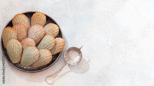 Freshly Baked french madeleine cookies. Homemade traditional French small cookie. photo