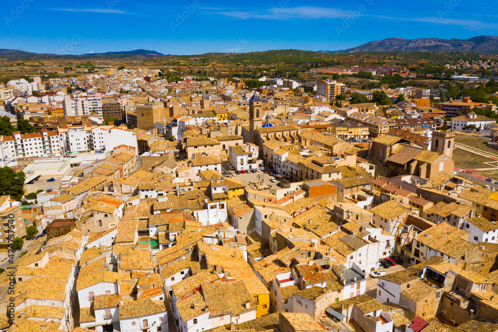 Scenic view from drone of ancient quarter of historic Spanish town of Requena overlooking typical architecture and narrow streets on sunny fall day, Valencia