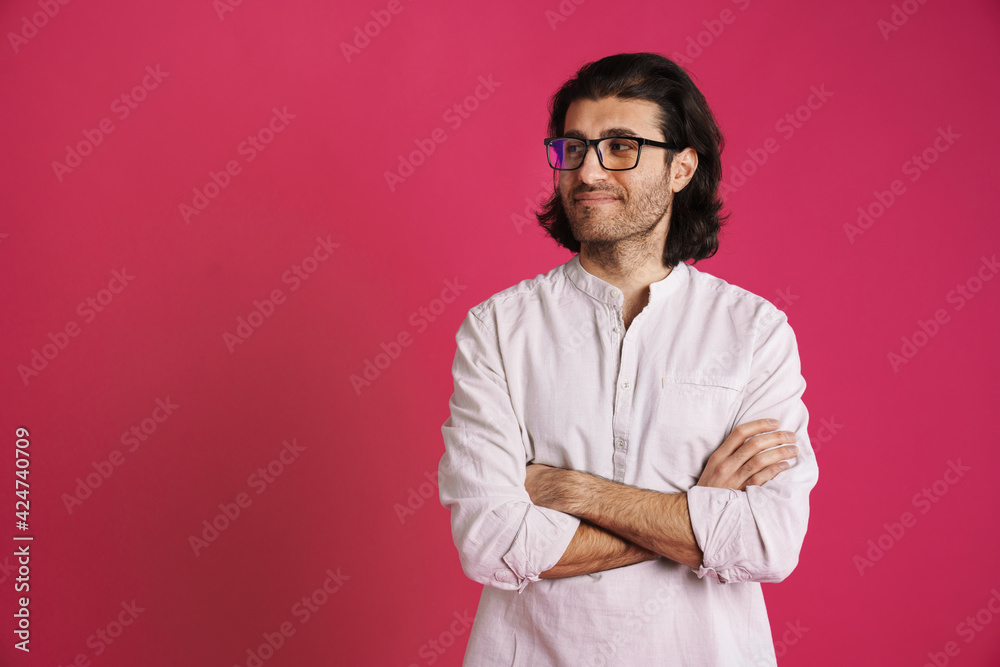 White brunette man in eyeglasses smiling and looking aside White brunette man in eyeglasses smiling and looking aside