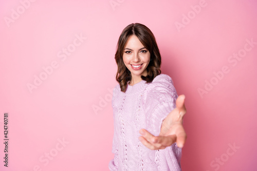 Photo of flirty lovely young lady raise palm you wear knitted pullover isolated pink color background