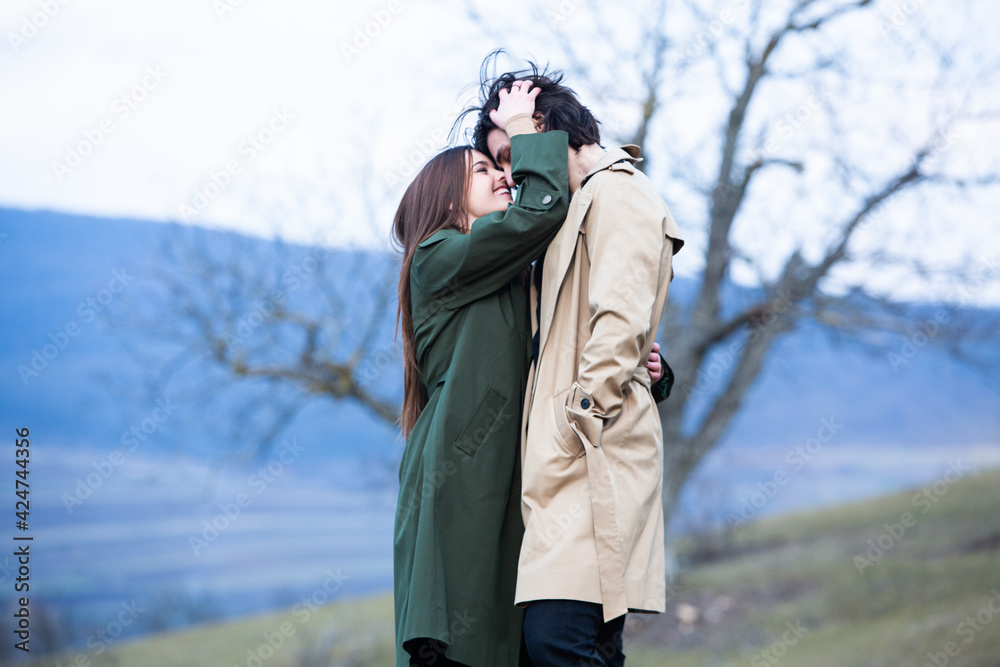 Beautiful sensual portrait of young stylish couple in love.Image of adorable brunette couple in love. Happy family. Beautiful sensual portrait of young stylish couple in love.Image of adorable brunette couple in love. Happy family.