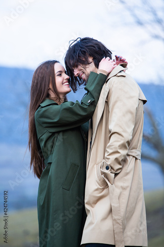 Beautiful sensual portrait of young stylish couple in love.Image of adorable brunette couple in love. Happy family.