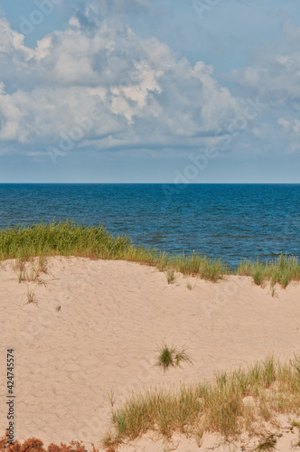 Clean sand beach and blue sky and sea