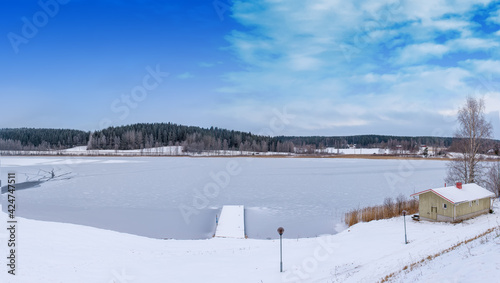 Snow and frozen lake in Finland © Yury