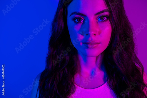 Cropped photo of young attractive girl fluorescent light nightclub isolated over bright color background