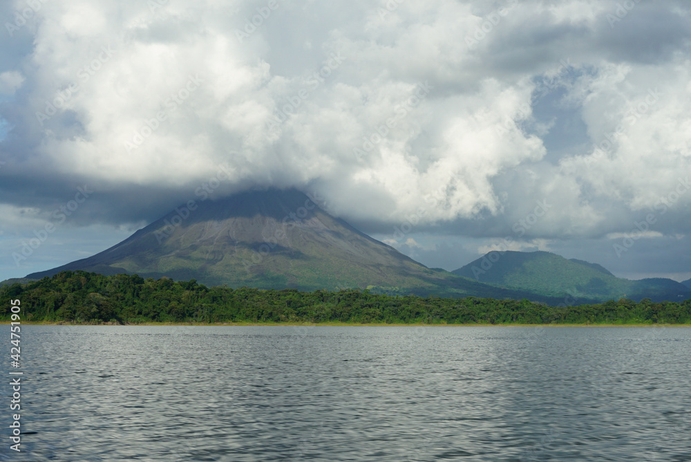 Arenal volcano behind clouds in Costa Rica