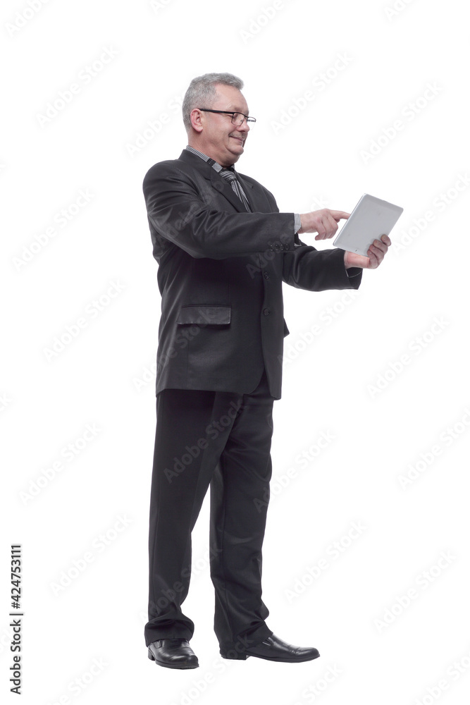 Full length portrait of a mature man using tablet computer over Full length portrait of a mature man using tablet computer over