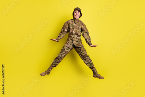 Full size photo of carefree cheerful girl open mouth scream have good mood isolated on yellow color background