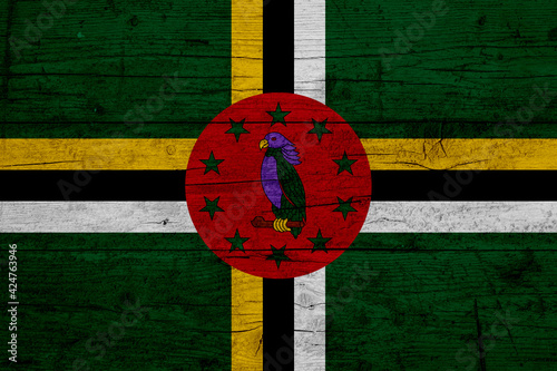 Flag of Dominica Wooden texture of the flag of Dominica photo