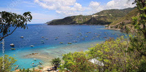 Beautiful Beach with Many Fishing Boats on Sunny Afternoon in Tanjung Kramat, Gorontalo, Indonesia