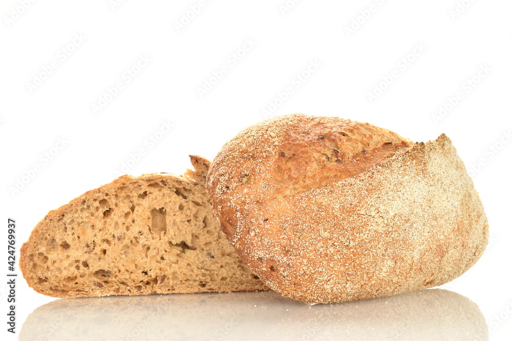 Two halves of a loaf of bread, close-up, isolated on white.