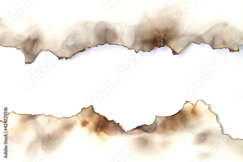 Burnt old torn paper on white page background