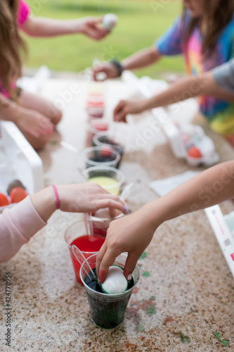 kids dying Easter eggs