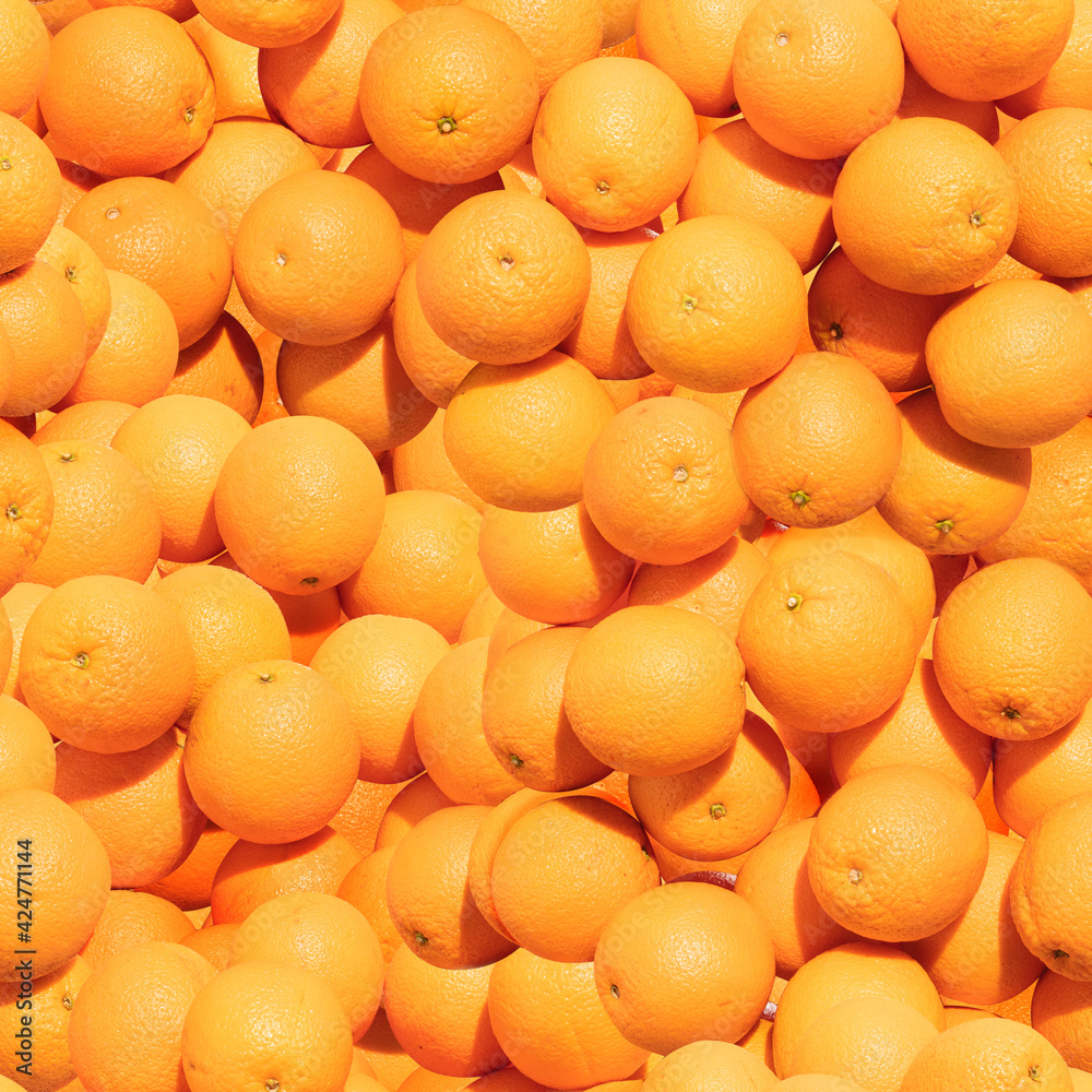 Pattern made from bunch of oranges. Top view, flat design. Healthy food.