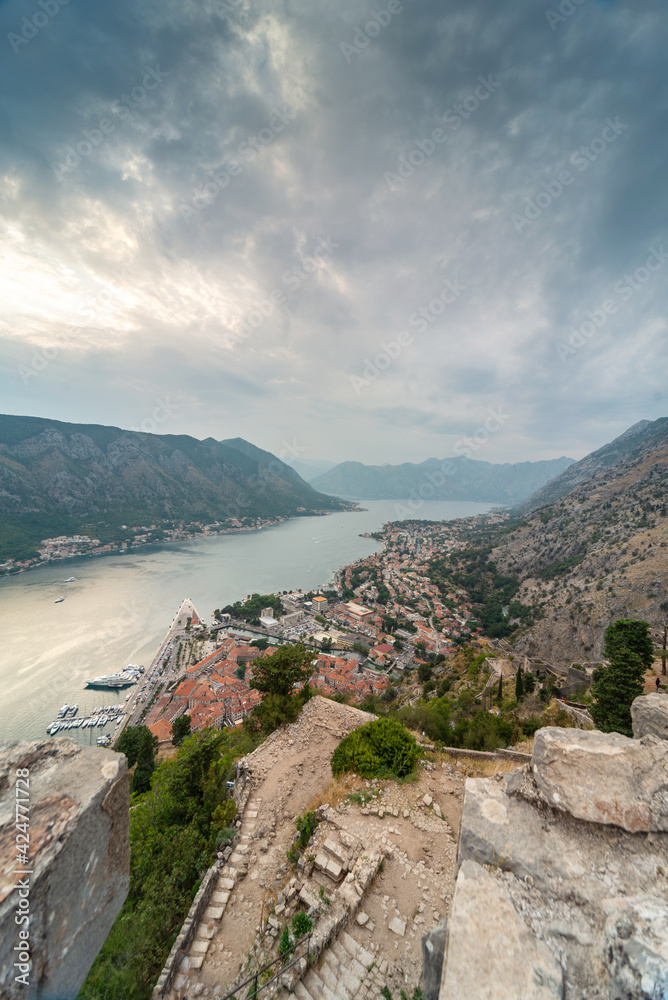 Kotor Bay towards the sunset from St John's Fortress,overlooking Old Town below, Montenegro,Eastern Europe.