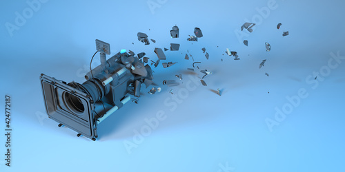 movie camera in blue light collapsing into small parts