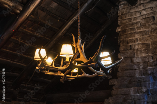 Chandelier made of horns in old cabin