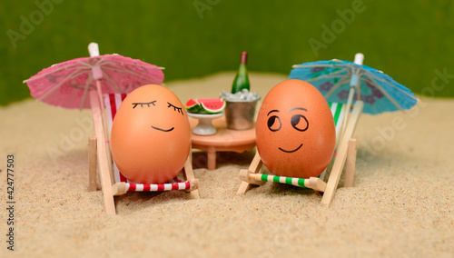 easter funny eggs under umbrella