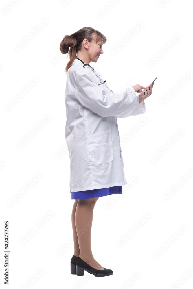 Side view of a doctor woman using a smart phone Side view of a doctor woman using a smart phone
