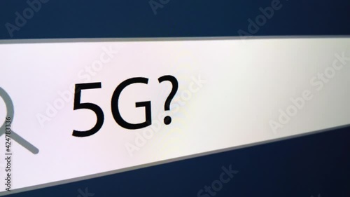 5G written in search bar with cursor, computer monitor, close-up with camera zoom effect