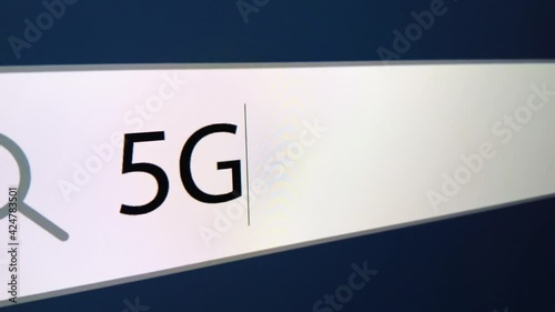 5G chipping written in search bar with cursor, computer monitor, close-up with camera zoom effect