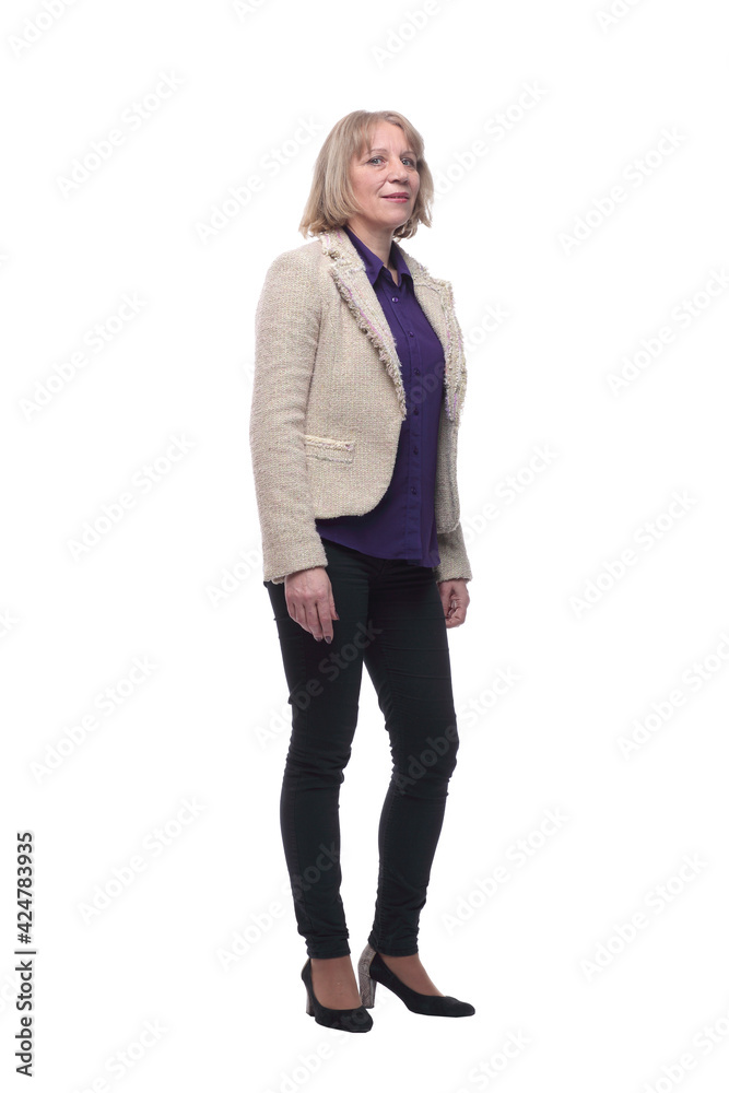 Full length studio photo of attractive adult woman standing with her hand on her hip Full length studio photo of attractive adult woman standing with her hand on her hip