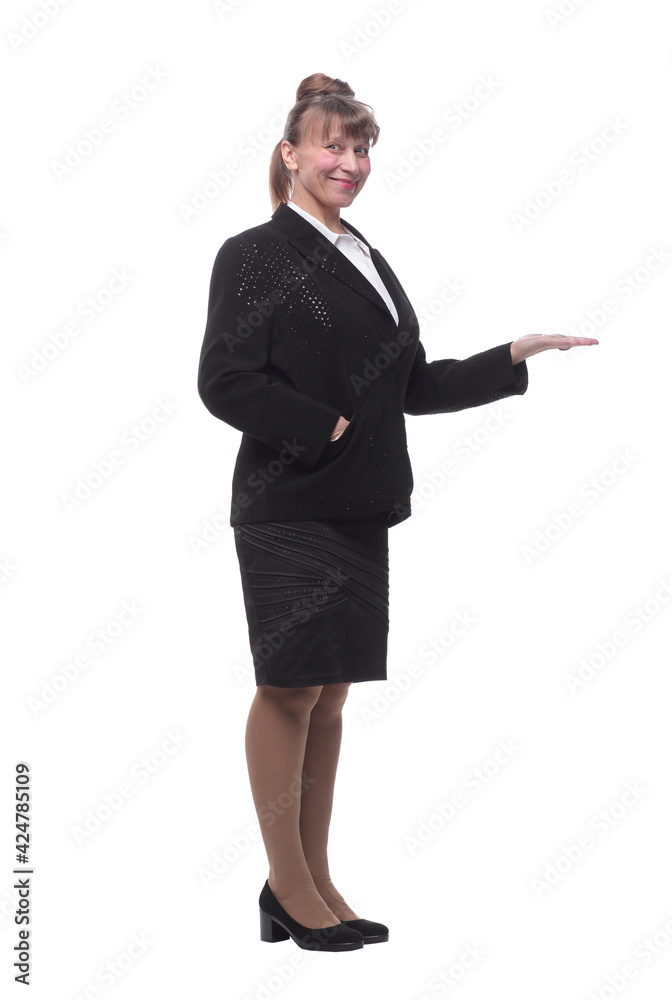 Full length, side view of a confident young business woman standing with folded hands Full length, side view of a confident young business woman standing with folded hands