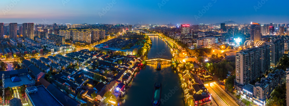 Fototapeta premium Aerial photography of the night view of the ancient buildings on the Gongchen Bridge in Hangzhou