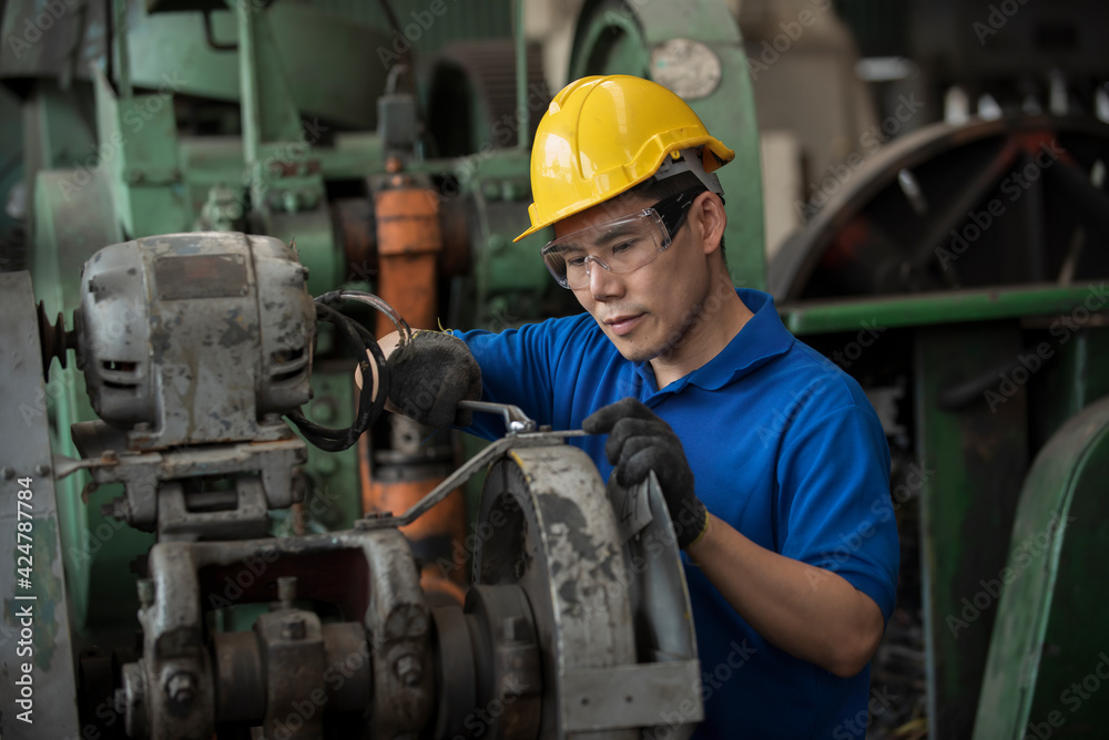 Worker in factory doing countersinking. worker work in factory.