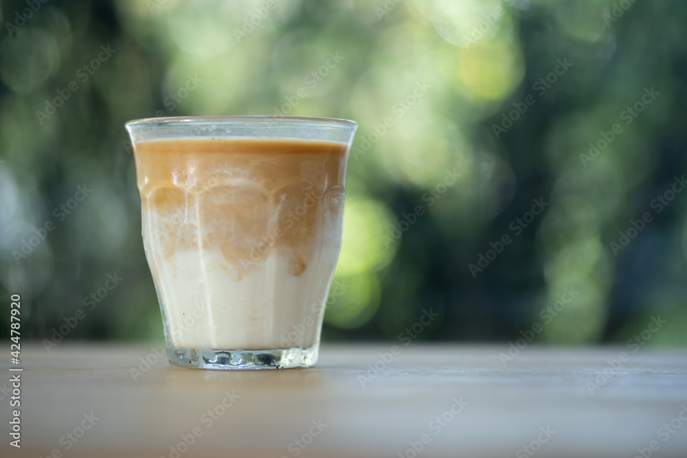Dirty coffee iced freeze milk pour espresso shot in a cup of coffee. Dirty coffee iced freeze milk pour espresso shot in a cup of coffee.