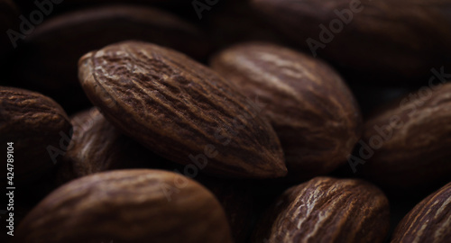 almonds close-up macrophotography dark background