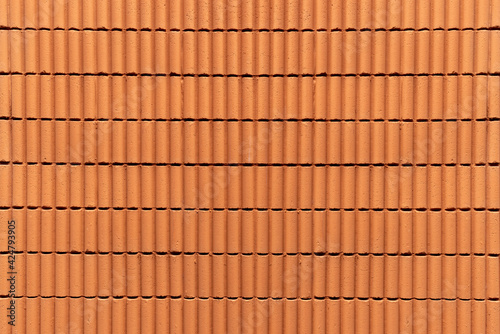 Orange pattern concrete wall texture background