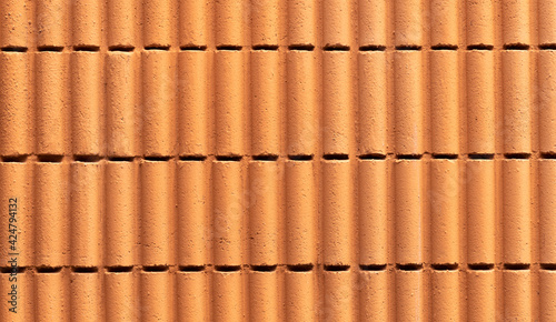 Orange pattern concrete wall texture background
