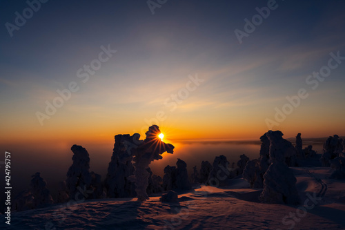 Rukatunturi, a fell and skiresort in Finnish Lapland, at midwinter sunset