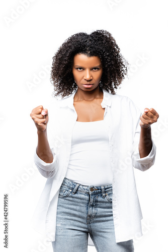 Angry african american woman looking at camera isolated on white