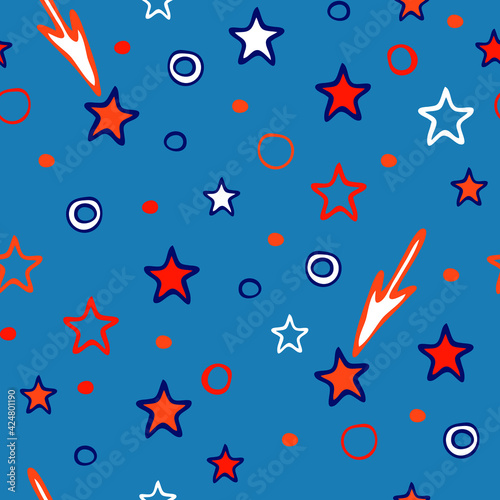 Seamless vector pattern with stars on blue background. Simple baby shower wallpaper design. Shooting star fashion textile. © Randmaart