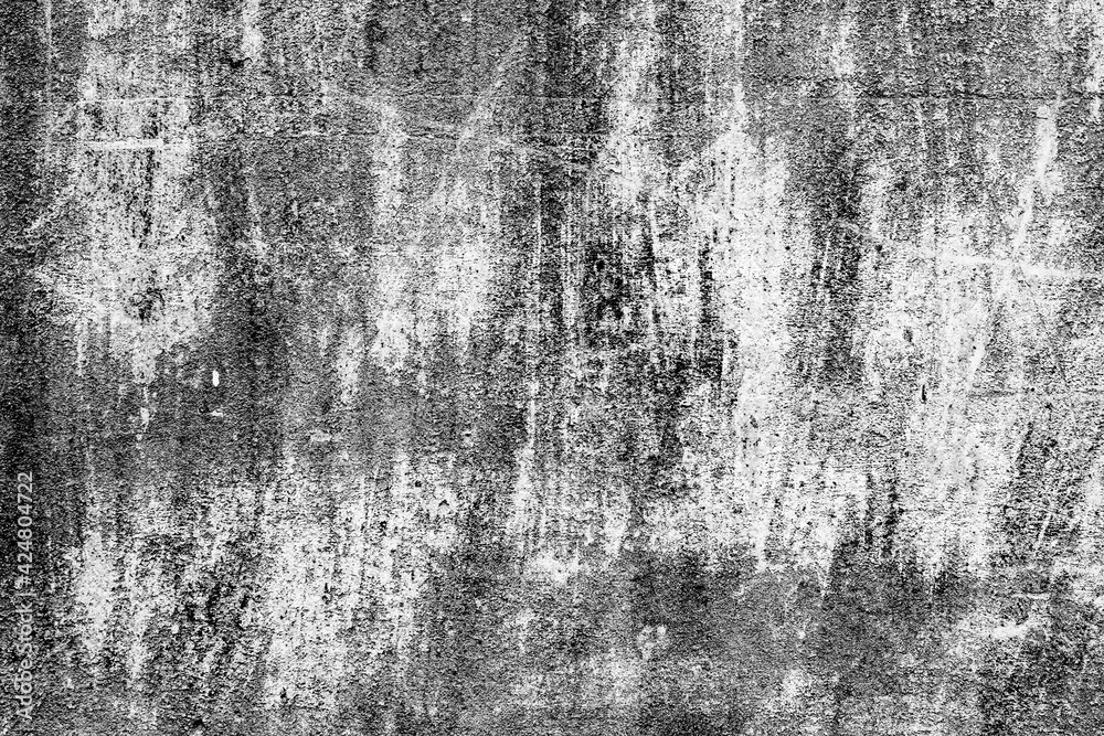 Fototapeta premium Texture of a concrete wall with cracks and scratches which can be used as a background