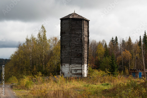 old wooden water tower alone