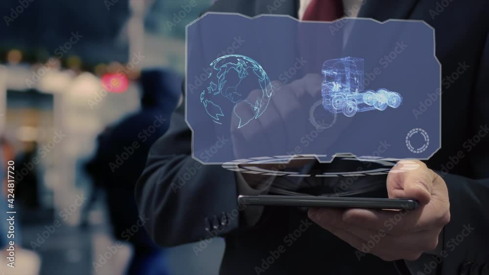 Unrecognizable businessman uses hologram on smartphone with modern EURO TIR Truck. Man in shirt and jacket with holographic screen on background of entrance to the airport or train station