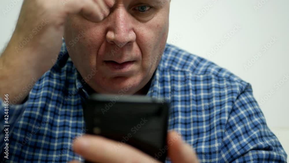 Businessman Use a Mobile Phone, Send Messages and Gesticulate Nervously and Disappointed Businessman Use a Mobile Phone, Send Messages and Gesticulate Nervously and Disappointed