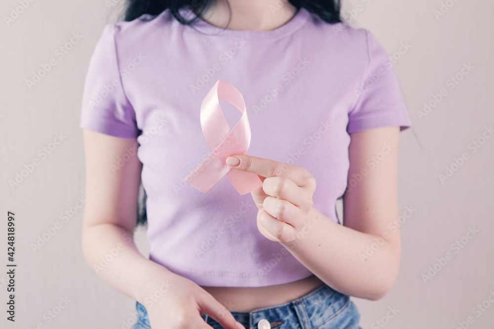 girl holding red ribbon sign cancer girl holding red ribbon sign cancer