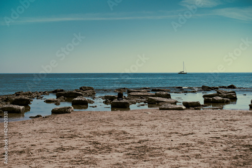 Sicily  April 2021 - Long shot of a beach in Sicily  sea rocks and good light