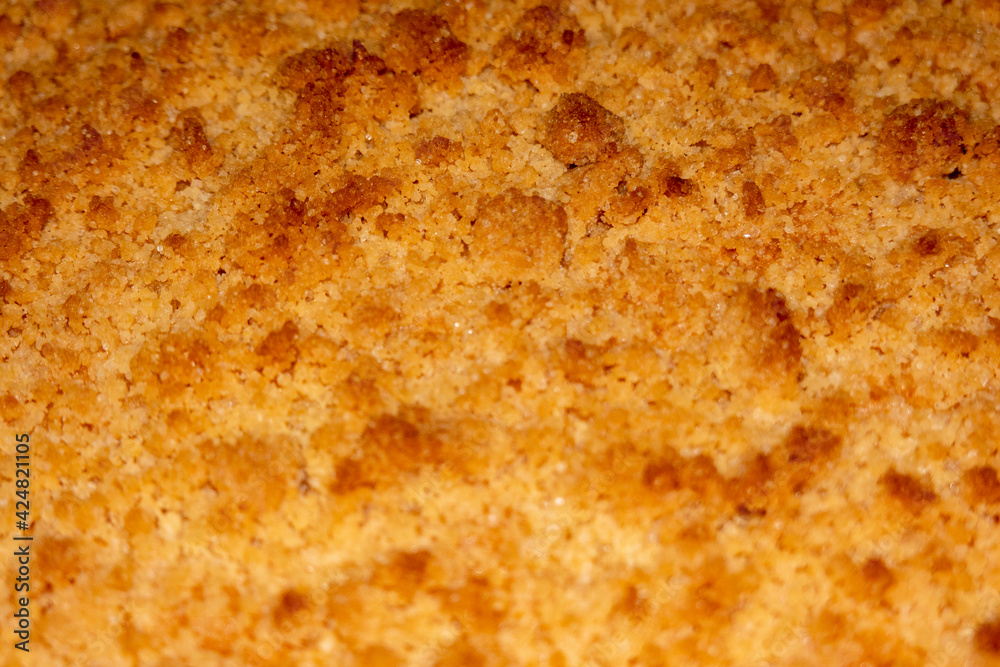 Dough crumble on fresh crumble cake