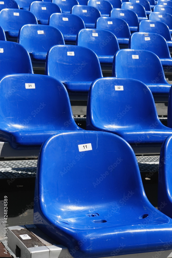 Fototapeta premium Blue Seats On Stadium